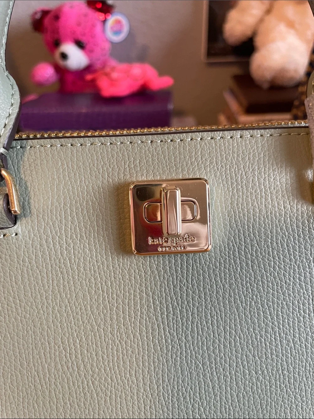 The Kate Spade KK114 refers specifically to the Phoebe East West Satchel